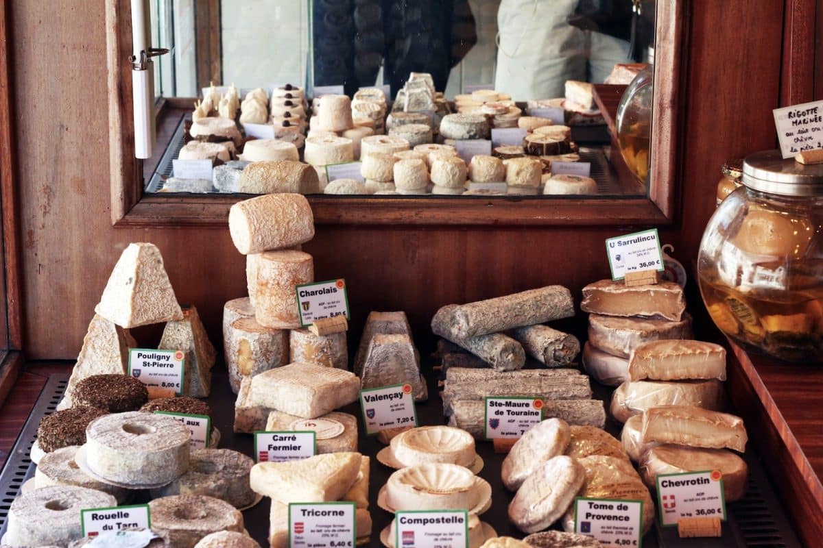 a bunch of different types of bread on a table